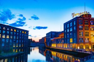 buildings and body of water during day