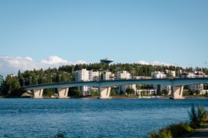 white bridge over blue sea under blue sky during daytime